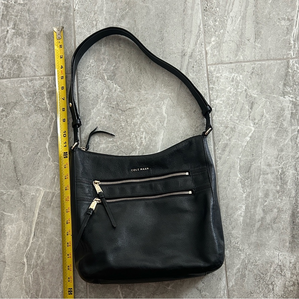Cole Haan beautiful black leather shoulder/Crossbody bag.